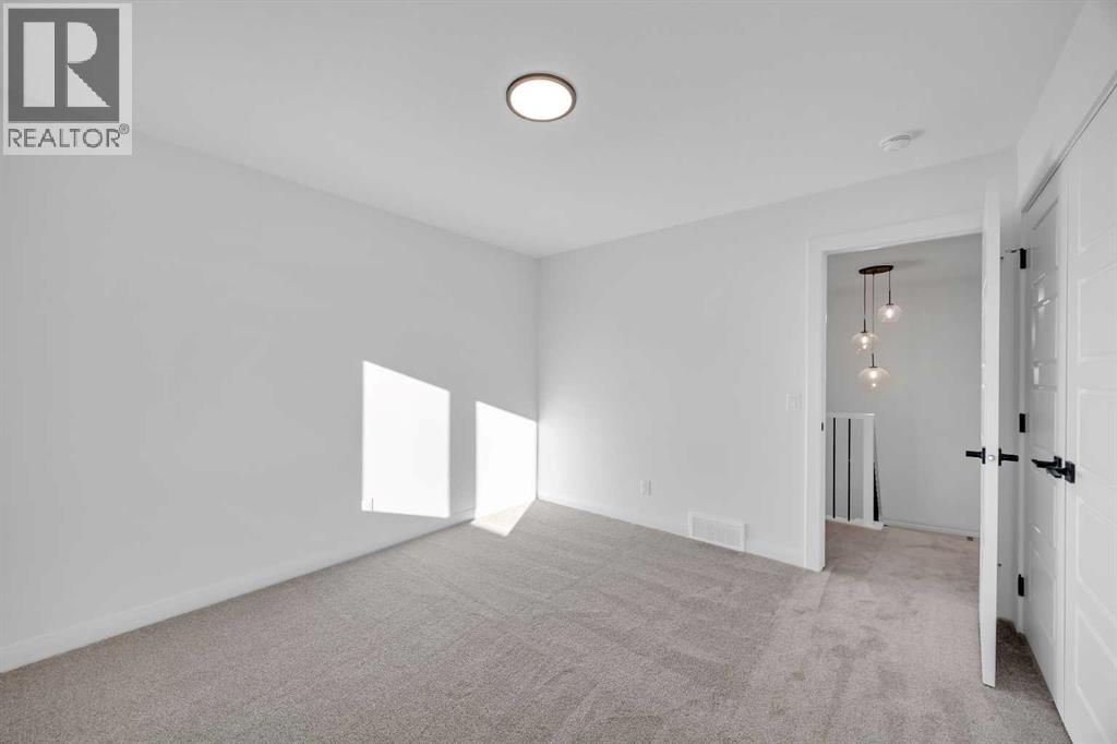 154 Northern Lights Crescent, Langdon, Alberta  T0J 1X2 - Photo 35 - A2290853