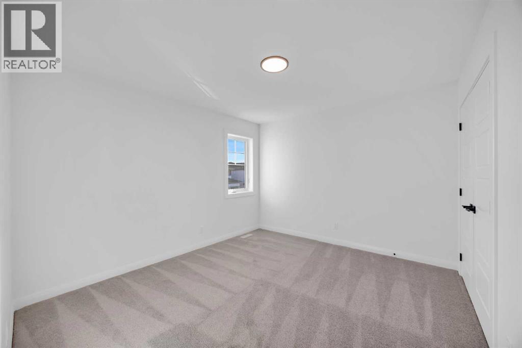 154 Northern Lights Crescent, Langdon, Alberta  T0J 1X2 - Photo 36 - A2290853