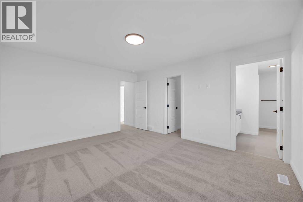 154 Northern Lights Crescent, Langdon, Alberta  T0J 1X2 - Photo 24 - A2290853