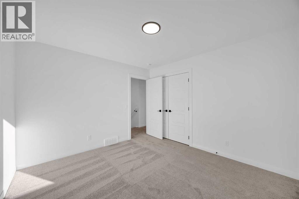 154 Northern Lights Crescent, Langdon, Alberta  T0J 1X2 - Photo 34 - A2290853