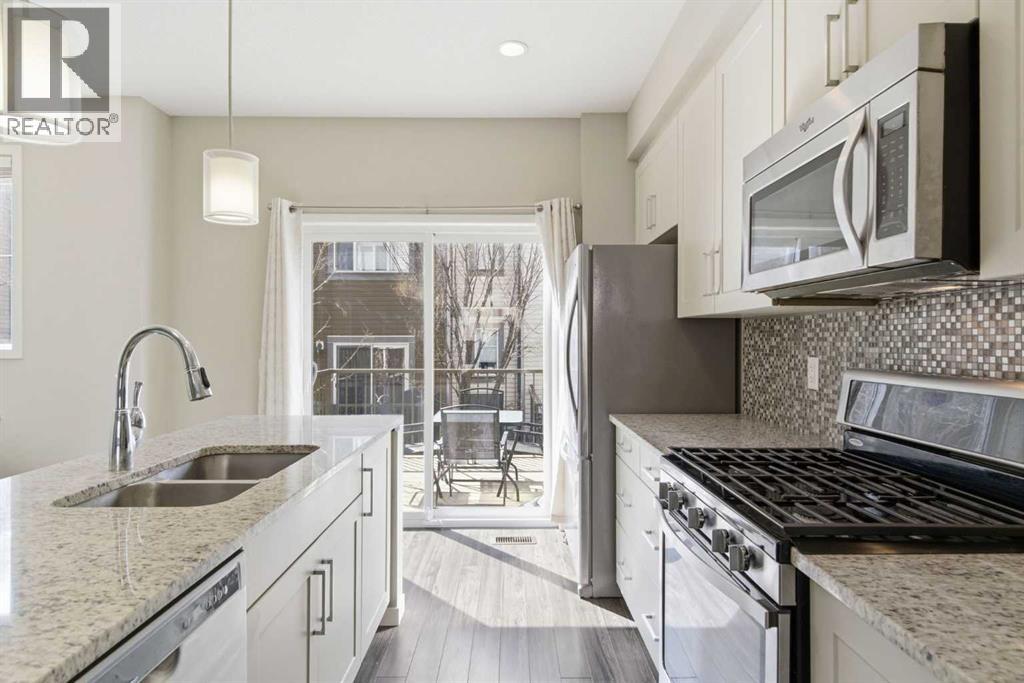 150 Copperpond Villas Se, Calgary, Alberta  T2Z 5B8 - Photo 7 - A2304949