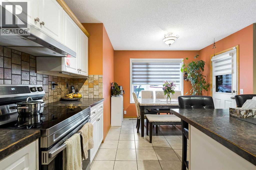 332 Harvest Hills Drive NE, Calgary, Alberta  T3K 4H7 - Photo 12 - A2288215
