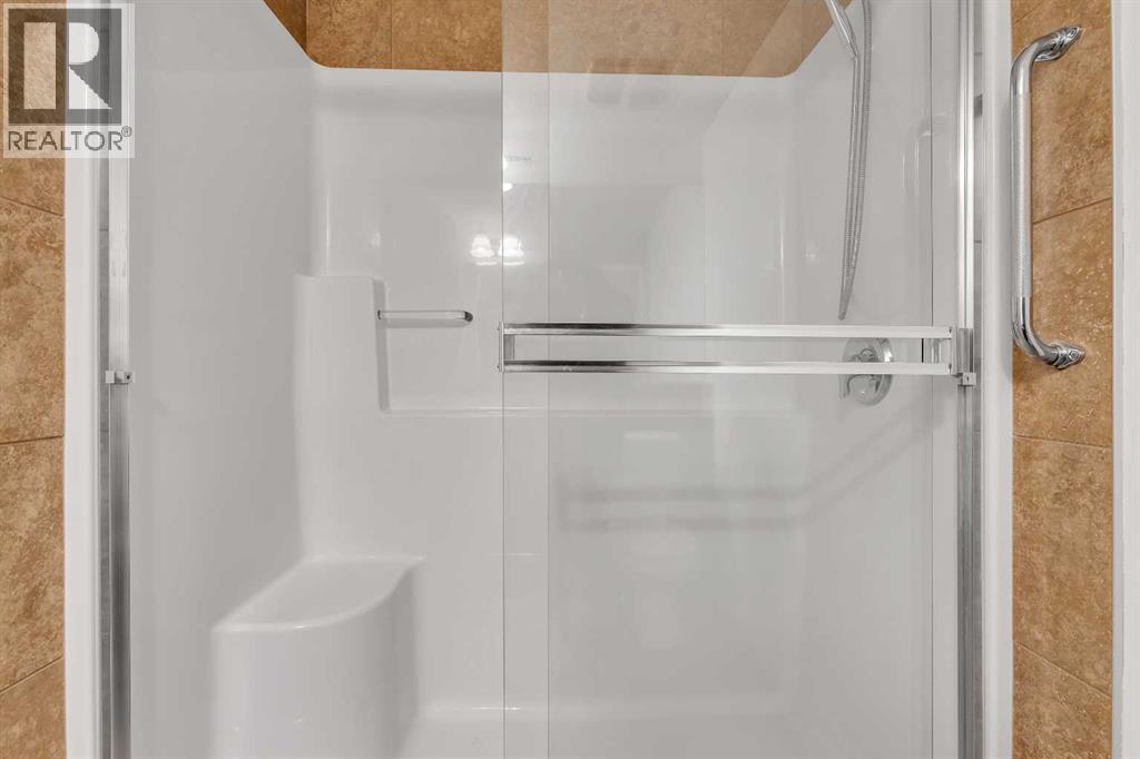 1202, 175 Panatella Hill NW, Calgary, Alberta  T3K 0V9 - Photo 16 - A2279506