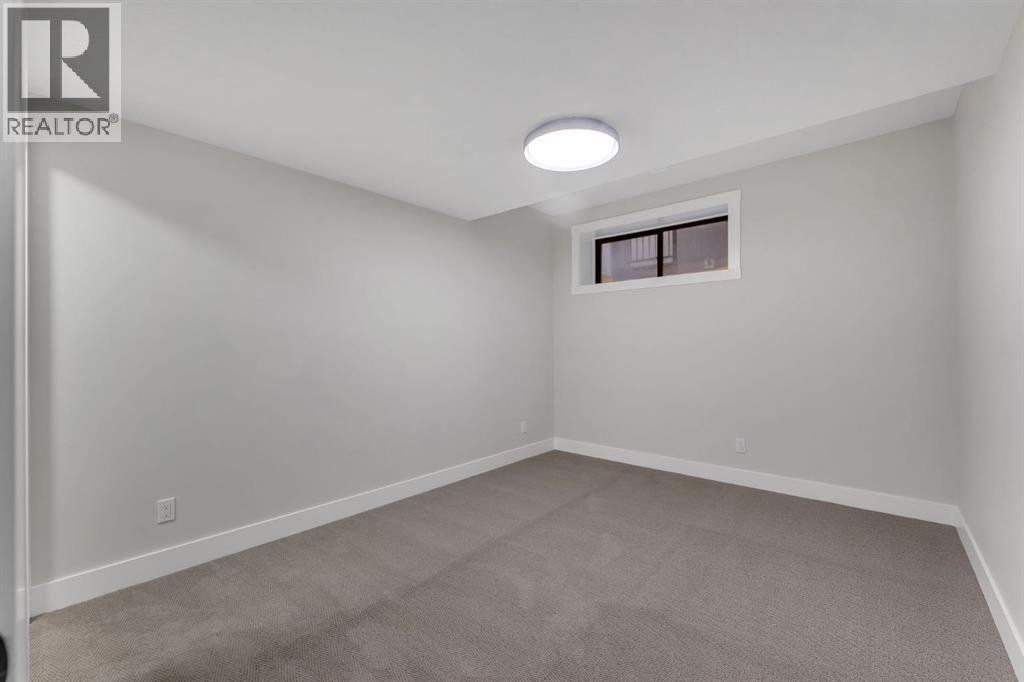 12 Spring Creek Point Sw, Calgary, Alberta  T3H 6E2 - Photo 38 - A2304938