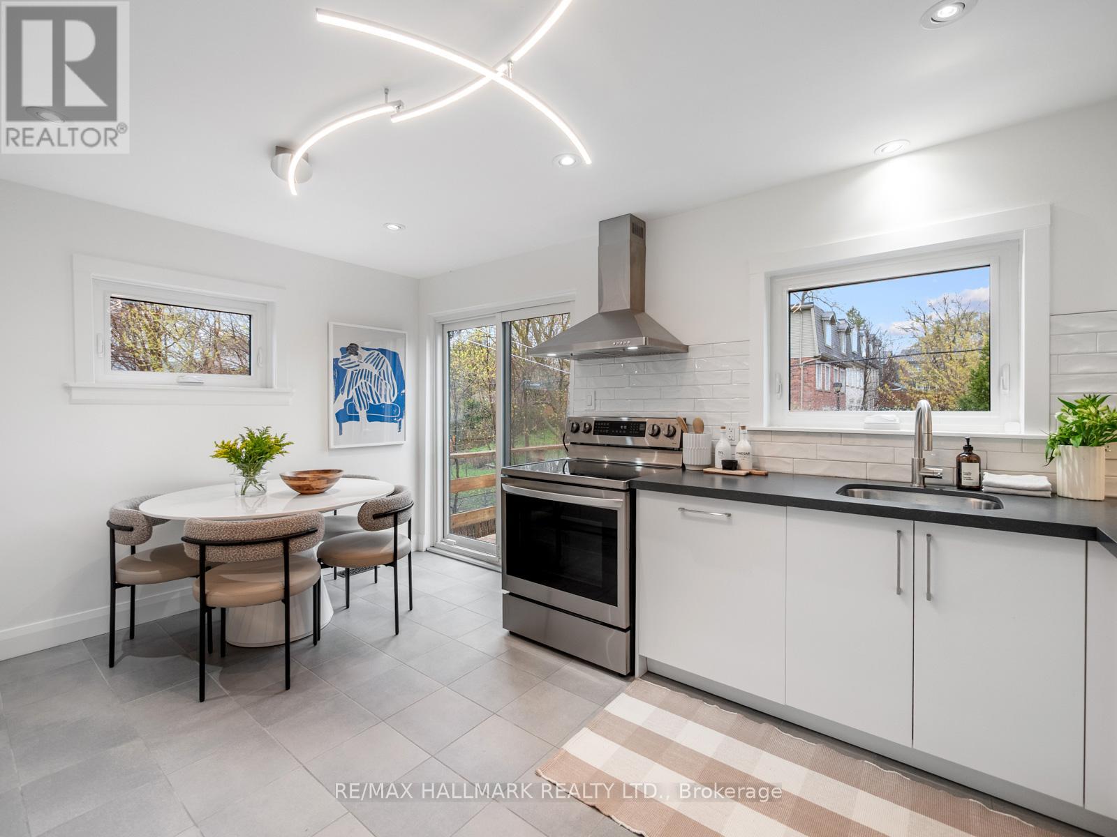 88 Eastwood Road, Toronto, Ontario  M4L 2C8 - Photo 12 - E13052026