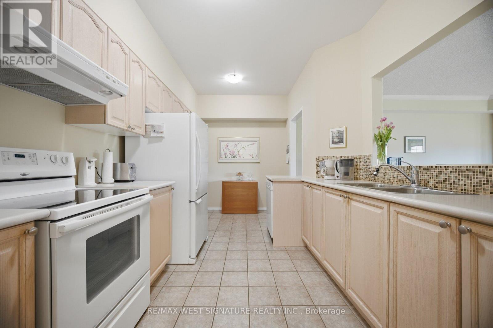 102 - 75 Treelawn Boulevard, Vaughan, Ontario  L0J 1C0 - Photo 12 - N13052146