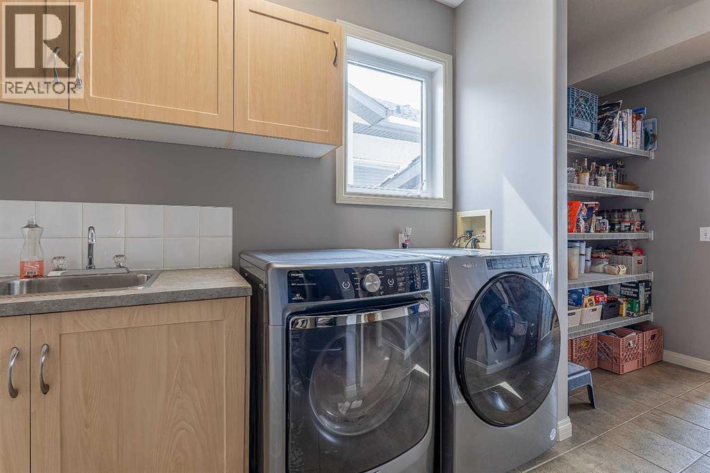 812 Coopers Drive Sw, Airdrie, Alberta  T4B 2W3 - Photo 34 - A2305355