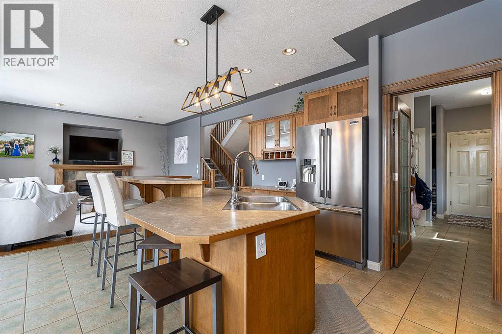 812 Coopers Drive Sw, Airdrie, Alberta  T4B 2W3 - Photo 6 - A2305355