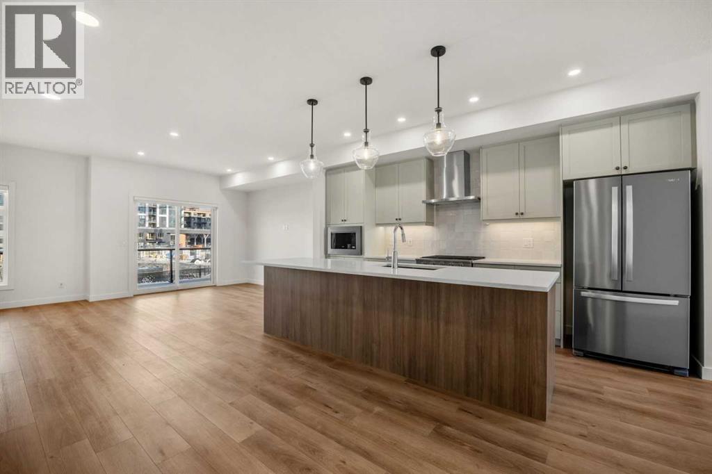 8341 8 Avenue Sw, Calgary, Alberta  T3H 6M8 - Photo 3 - A2283971