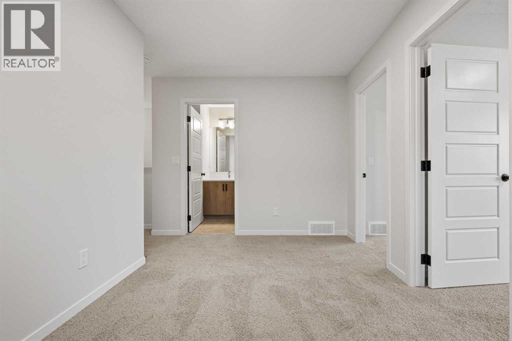 117 Bridgeport Gate, Chestermere, Alberta  T1X 3E5 - Photo 32 - A2285498