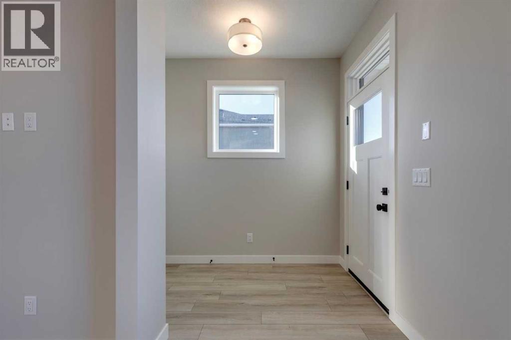 315 Fireside Drive, Cochrane, Alberta  T4C 2L6 - Photo 5 - A2283383