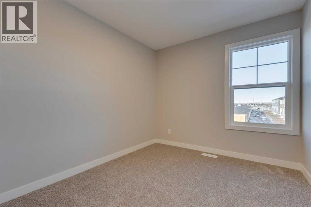 315 Fireside Drive, Cochrane, Alberta  T4C 2L6 - Photo 30 - A2283383