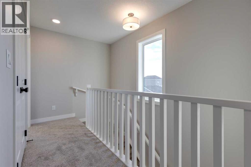 315 Fireside Drive, Cochrane, Alberta  T4C 2L6 - Photo 32 - A2283383