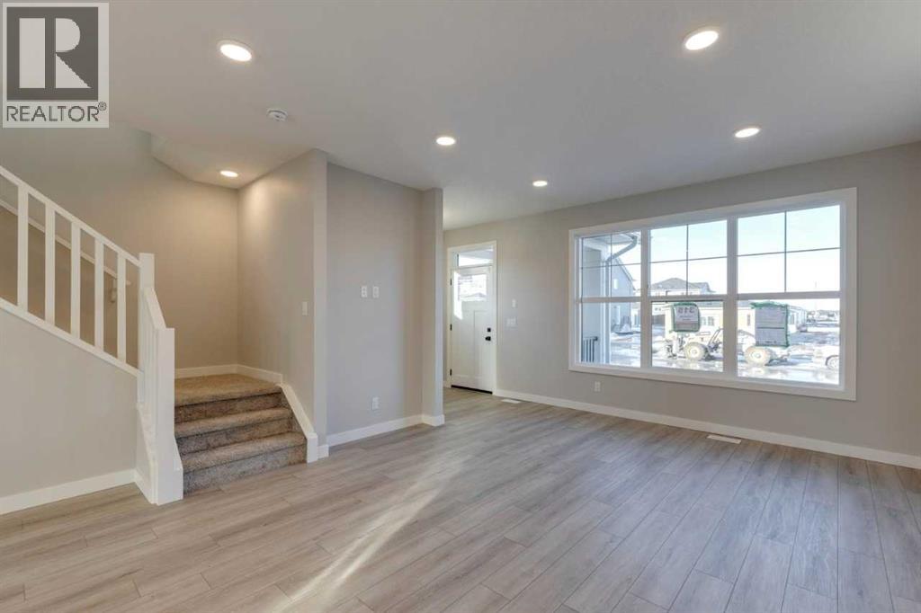 315 Fireside Drive, Cochrane, Alberta  T4C 2L6 - Photo 11 - A2283383