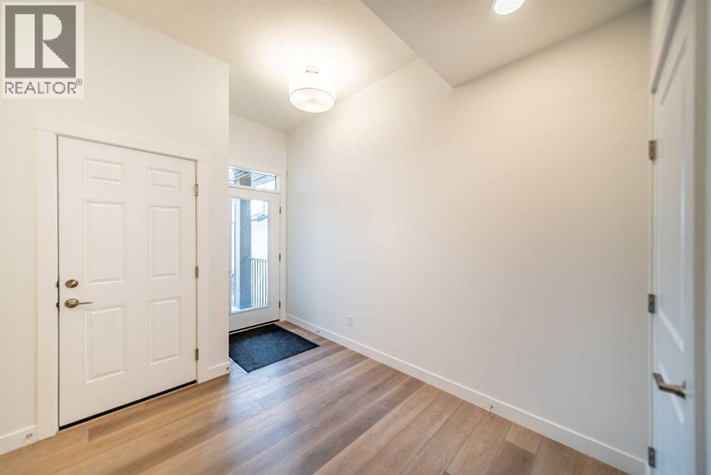 73 Royston Grove Nw, Calgary, Alberta  T3L 0M3 - Photo 3 - A2291753