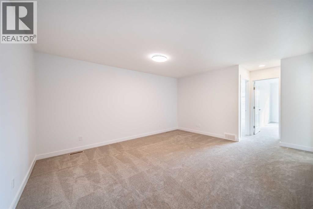 73 Royston Grove Nw, Calgary, Alberta  T3L 0M3 - Photo 18 - A2291753