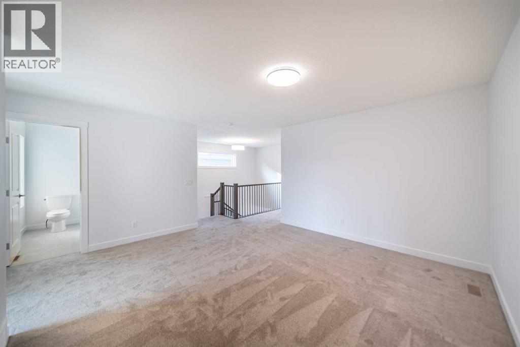 73 Royston Grove Nw, Calgary, Alberta  T3L 0M3 - Photo 19 - A2291753