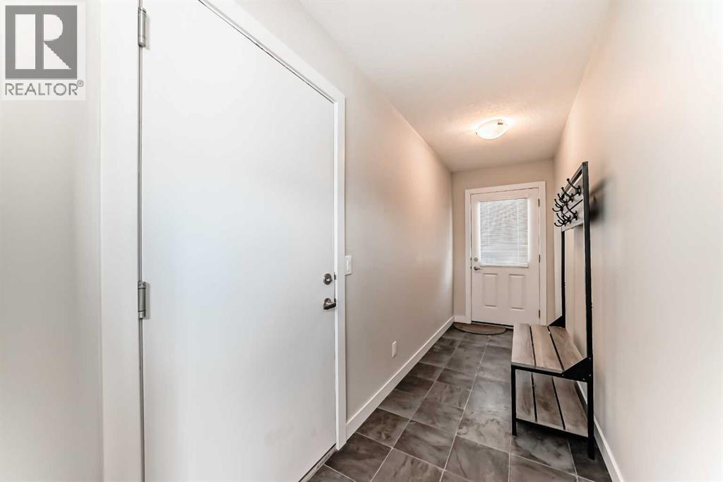 310 Sage Hill Grove Nw, Calgary, Alberta  T3R 0Z8 - Photo 5 - A2305825