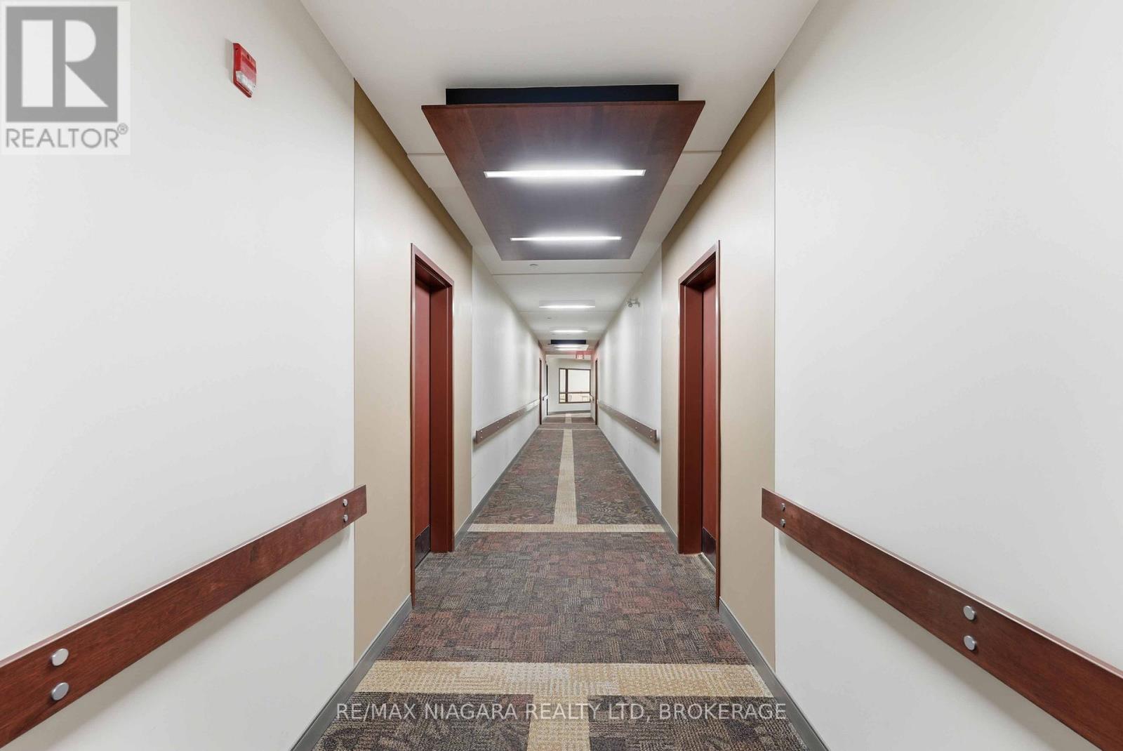 404 - 26 Wellington Street, St. Catharines, Ontario  L2R 5P8 - Photo 3 - X12929028