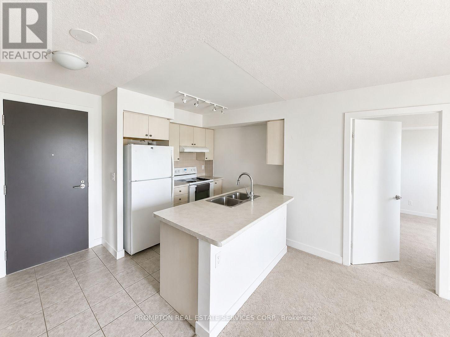 403 - 1346 Danforth Road, Toronto, Ontario  M1J 0A9 - Photo 2 - E12693510