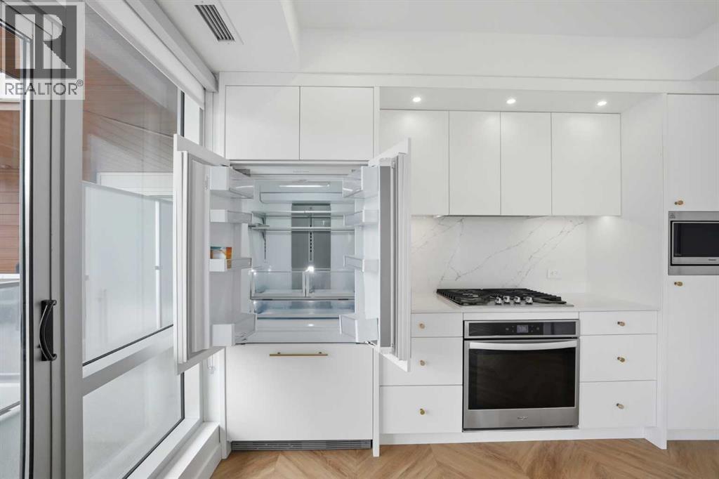 415, 8445 Broadcast Avenue SW, Calgary, Alberta  T3H 6B5 - Photo 11 - A2305255