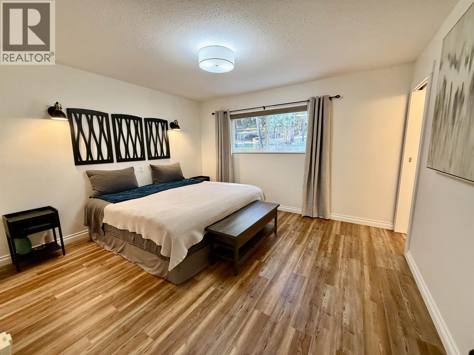 4975 Gloinnzun Drive, 108 Mile Ranch, British Columbia  V0K 2Z0 - Photo 17 - R3116349