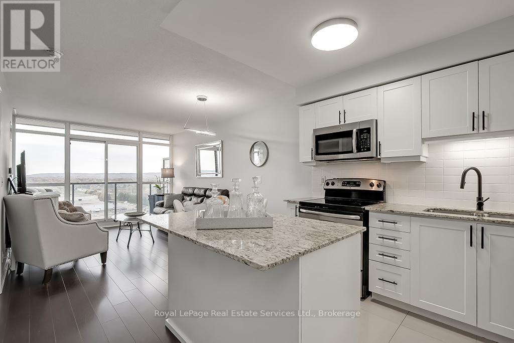 1205 - 1940 Ironstone Drive, Burlington, Ontario  L7L 0E4 - Photo 4 - W13054180