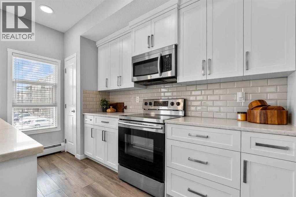 107, 360 Harvest Hills Common Ne, Calgary, Alberta  T3K 2N1 - Photo 19 - A2305983