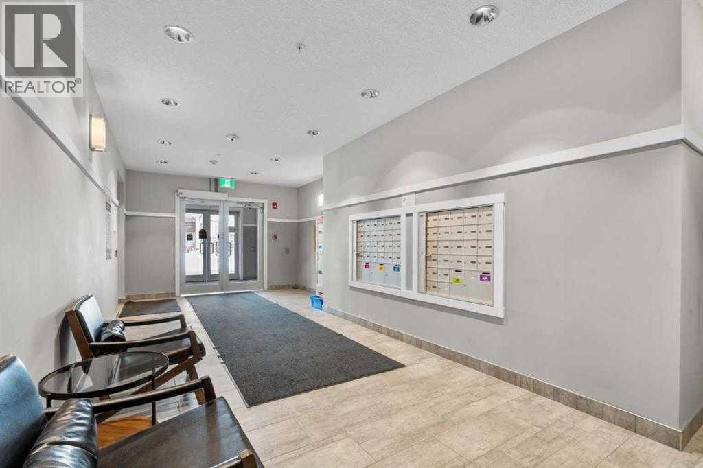 107, 360 Harvest Hills Common Ne, Calgary, Alberta  T3K 2N1 - Photo 4 - A2305983