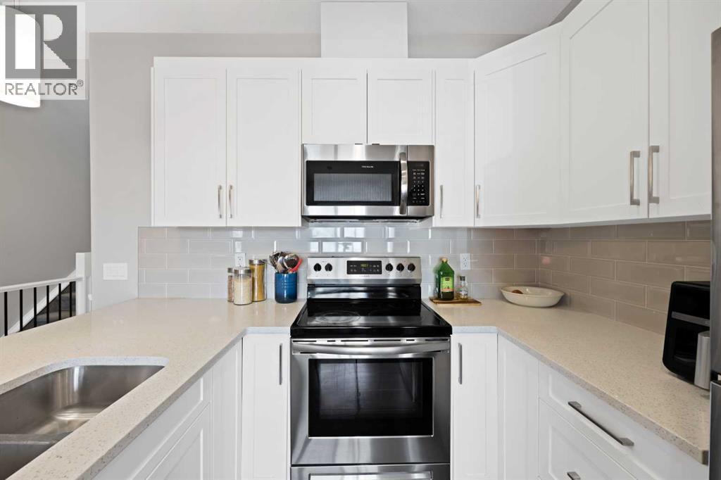 1167 Channelside Drive Sw, Airdrie, Alberta  T4B 4L3 - Photo 21 - A2304821