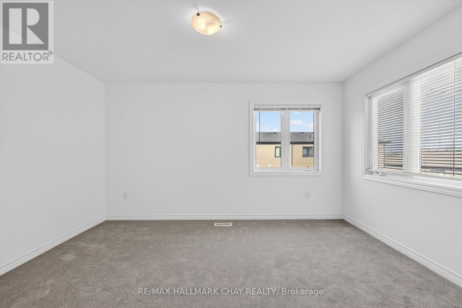 21 Pumpkin Corner Crescent, Barrie, Ontario  L9J 0T5 - Photo 9 - S13054366