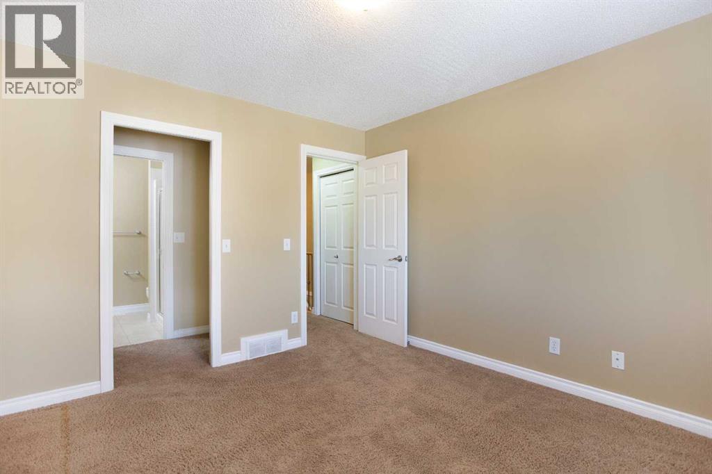 120 Cedarwood Lane Sw, Calgary, Alberta  T2W 6J3 - Photo 12 - A2286971