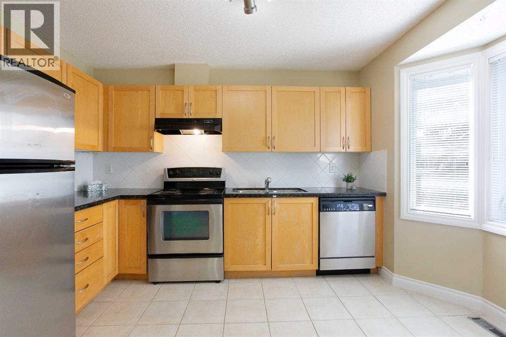 120 Cedarwood Lane Sw, Calgary, Alberta  T2W 6J3 - Photo 4 - A2286971