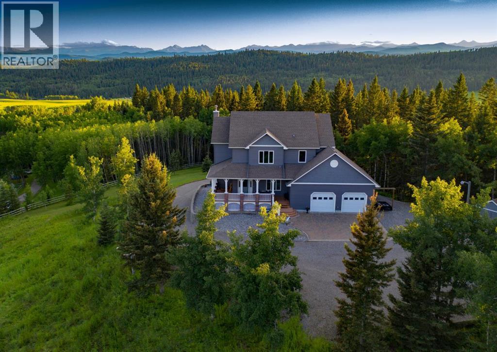 100, 290108 Parkins Road W, Rural Foothills County, Alberta  T0L 1K0 - Photo 1 - A2301845