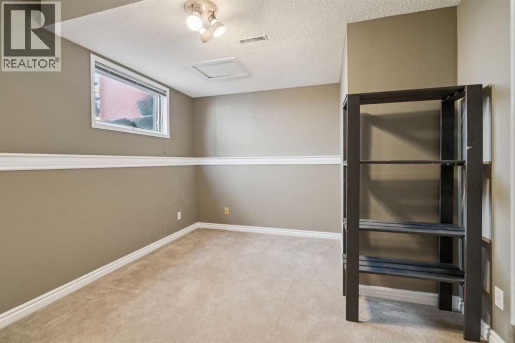 8373 Edgevalley Drive Nw, Calgary, Alberta  T3A 4X6 - Photo 13 - A2306025