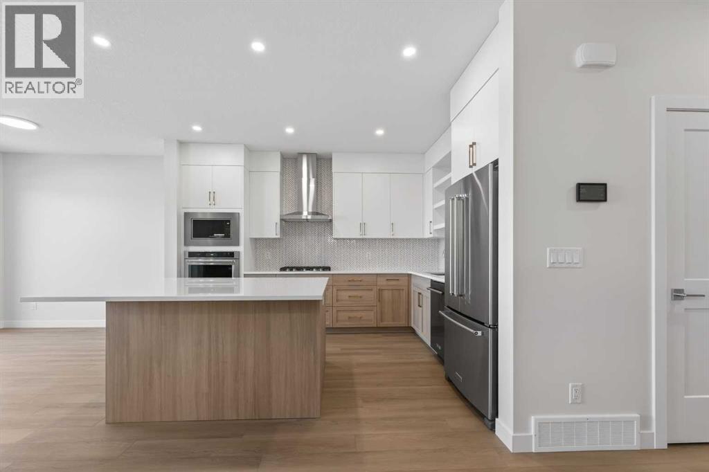 159 Greenwich Drive NW, Calgary, Alberta  T3B 6N9 - Photo 6 - A2288424