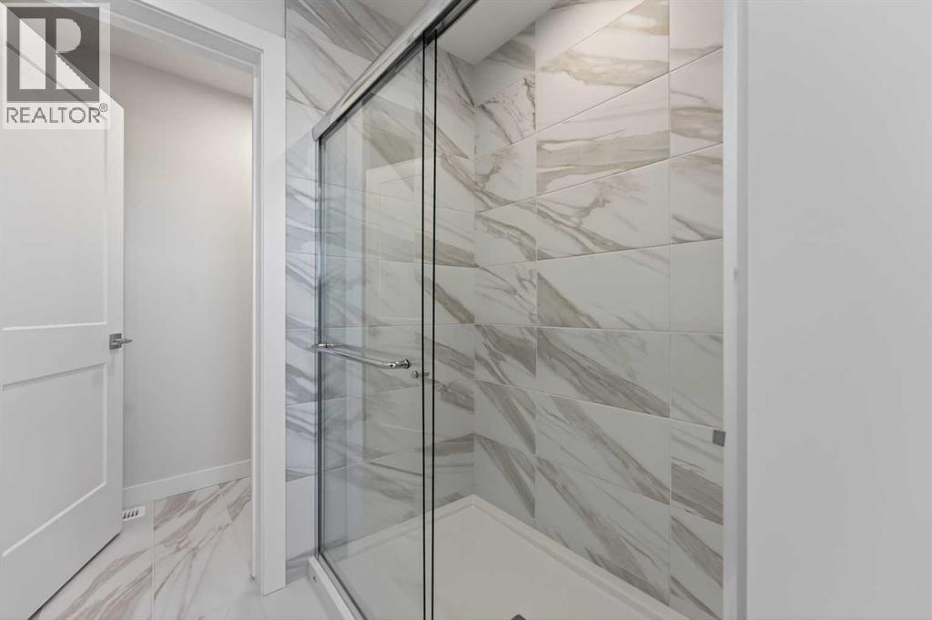 159 Greenwich Drive NW, Calgary, Alberta  T3B 6N9 - Photo 25 - A2288424