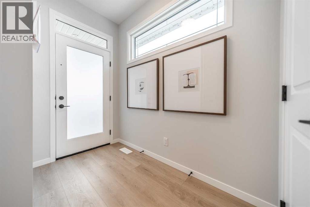 54 Creekview Avenue, Calgary, Alberta  T2X 6M1 - Photo 3 - A2306071