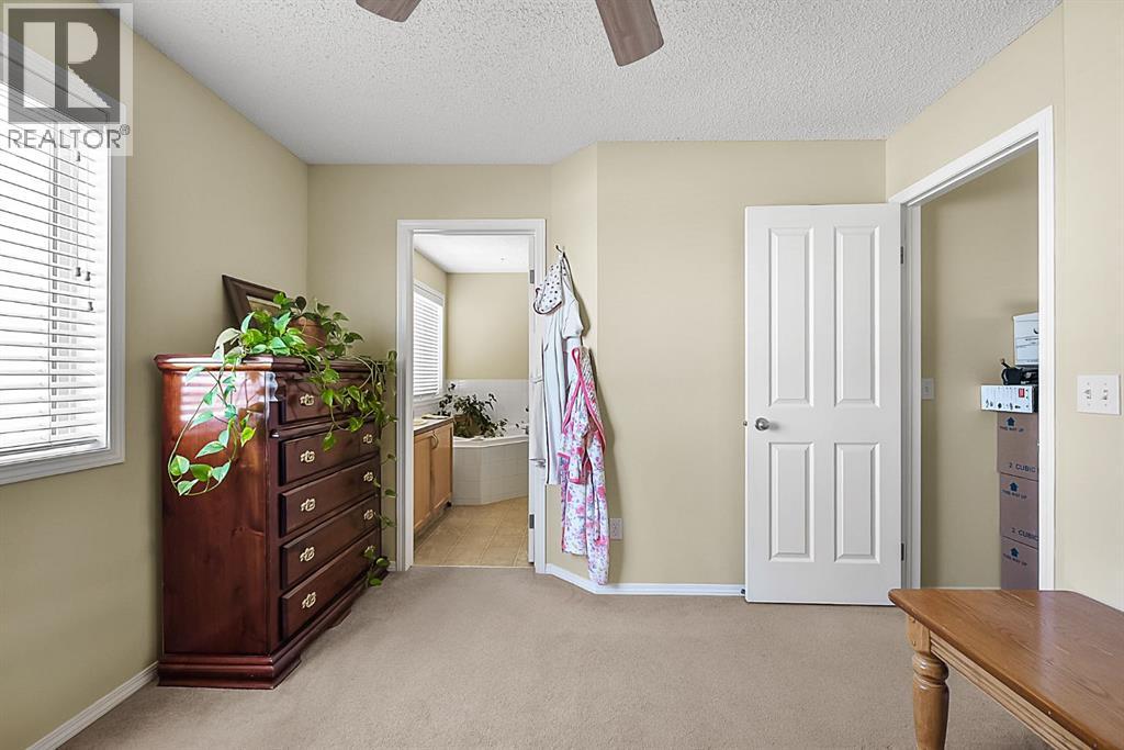 13 Tuscany Ridge Mews NW, Calgary, Alberta  T3L 3B7 - Photo 12 - A2303363