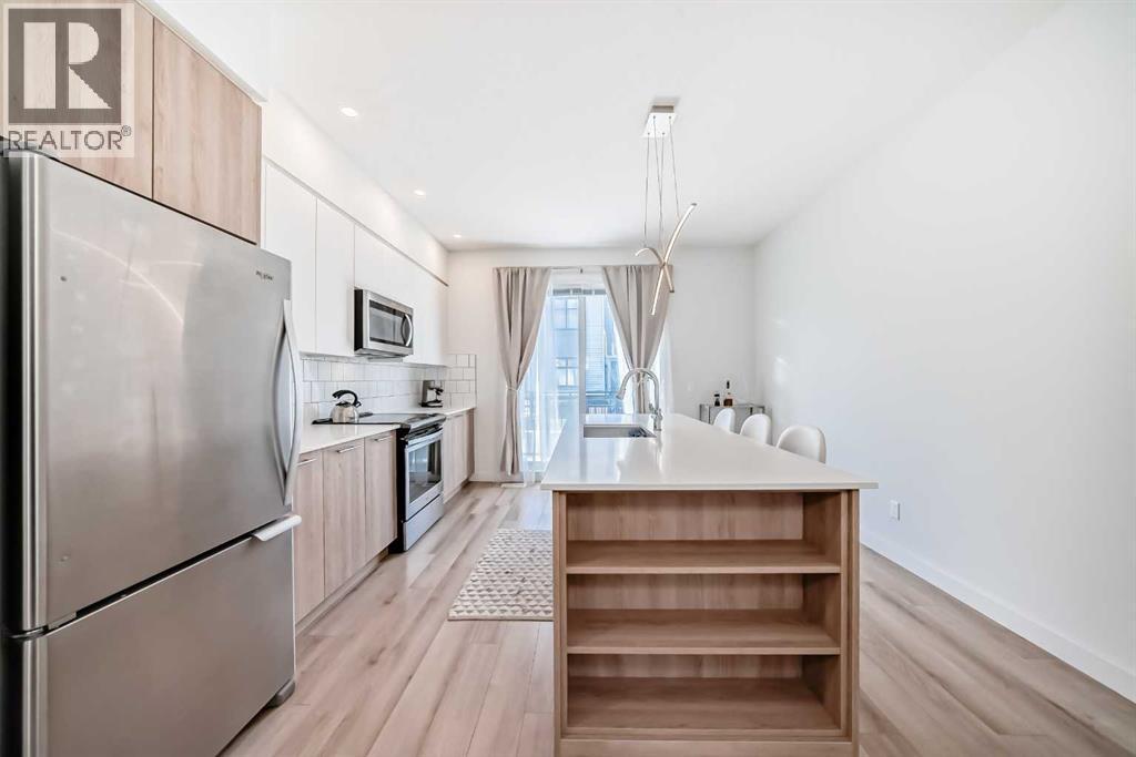 871 Belmont Drive Sw, Calgary, Alberta  T2X 4P2 - Photo 9 - A2306048