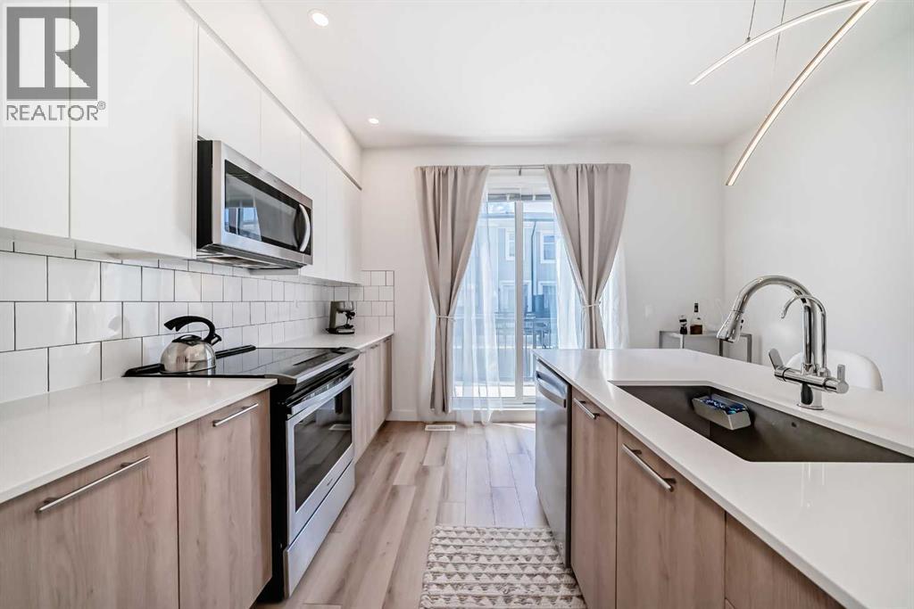 871 Belmont Drive Sw, Calgary, Alberta  T2X 4P2 - Photo 10 - A2306048