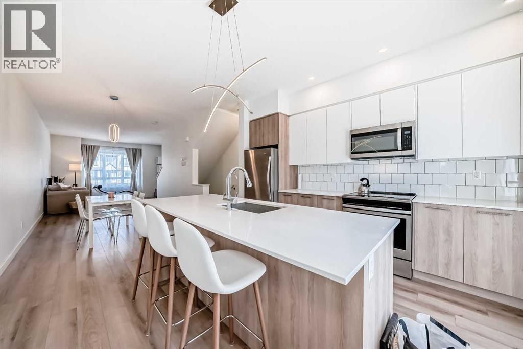 871 Belmont Drive Sw, Calgary, Alberta  T2X 4P2 - Photo 17 - A2306048