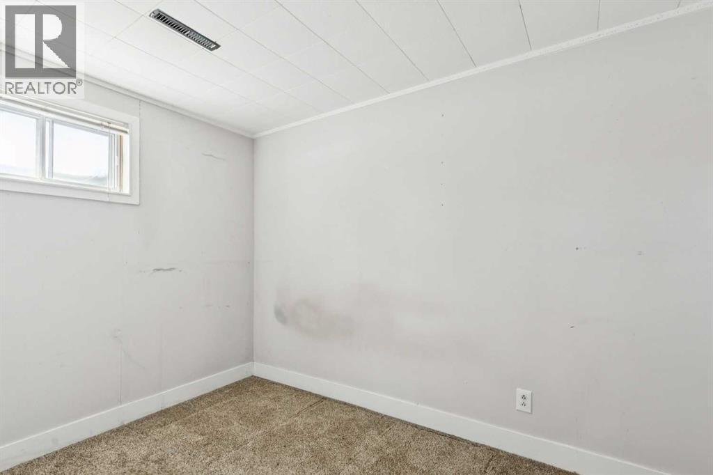 8312 47 Avenue Nw, Calgary, Alberta  T3B 1Z7 - Photo 12 - A2303139