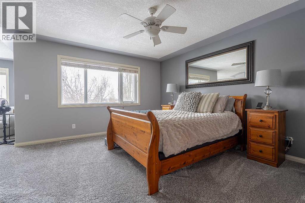 812 Coopers Drive SW, Airdrie, Alberta  T4B 2W3 - Photo 13 - A2305355