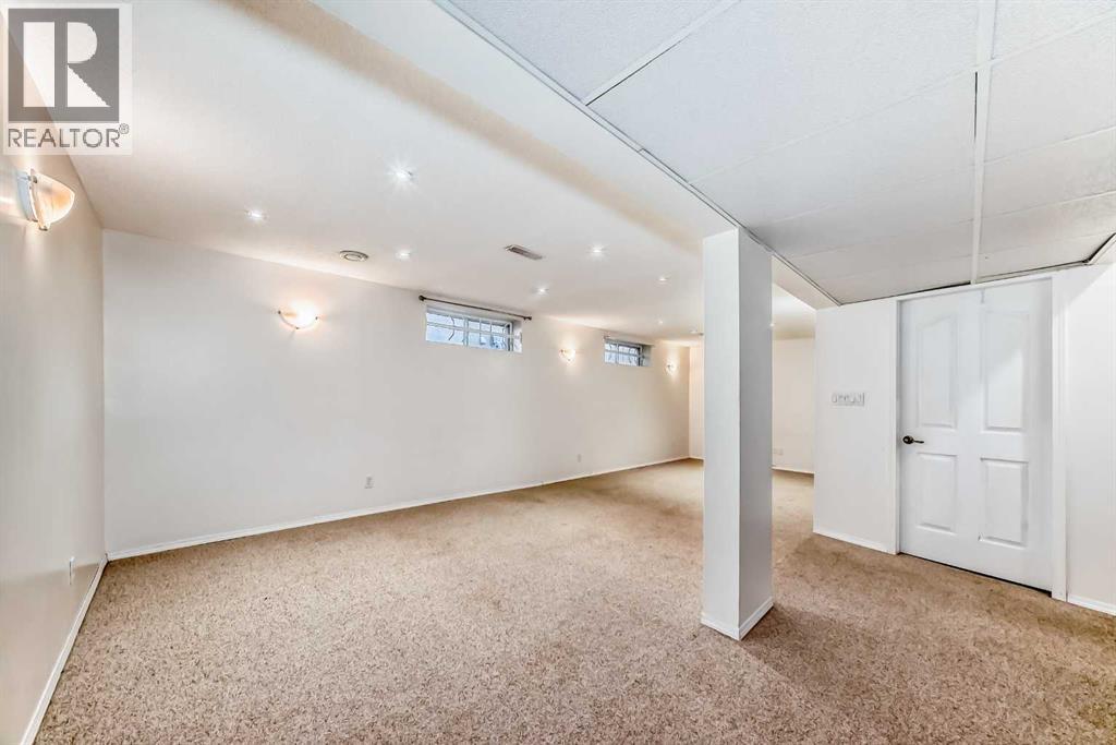 128 Harvest Park Road NE, Calgary, Alberta  T3K 4H9 - Photo 34 - A2305181