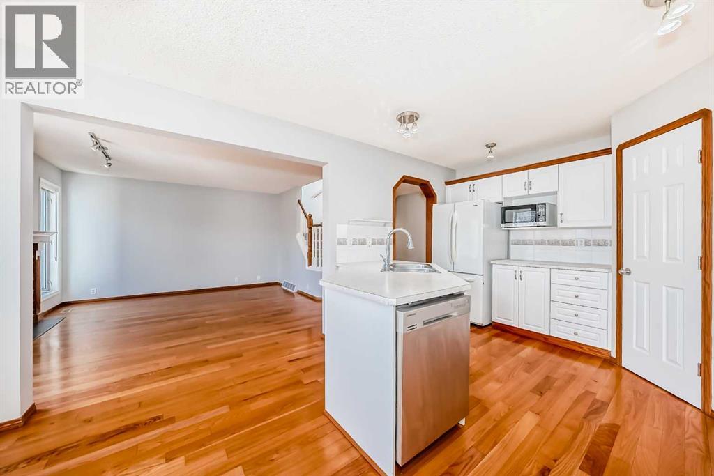 128 Harvest Park Road NE, Calgary, Alberta  T3K 4H9 - Photo 5 - A2305181