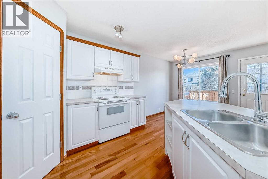 128 Harvest Park Road NE, Calgary, Alberta  T3K 4H9 - Photo 8 - A2305181