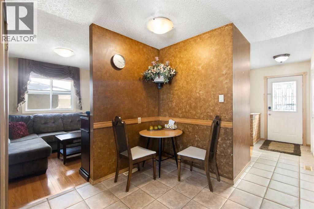 1108 Marcombe Crescent NE, Calgary, Alberta  T2A 4H7 - Photo 7 - A2303472
