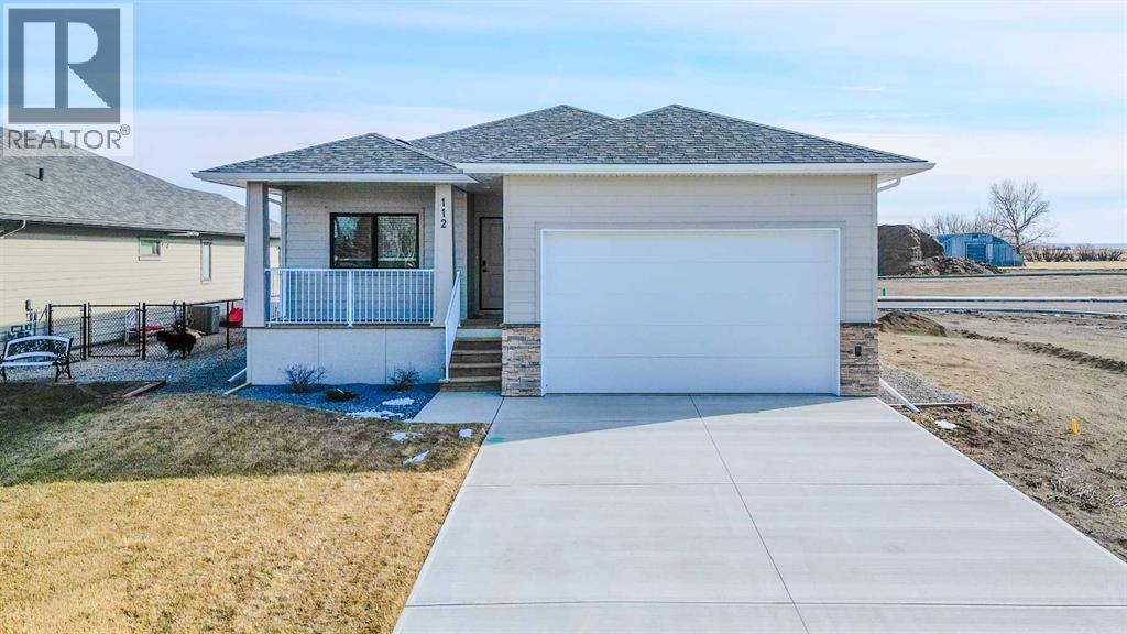 112 E 300 S, Raymond, Alberta  T0K 2S0 - Photo 1 - A2272560