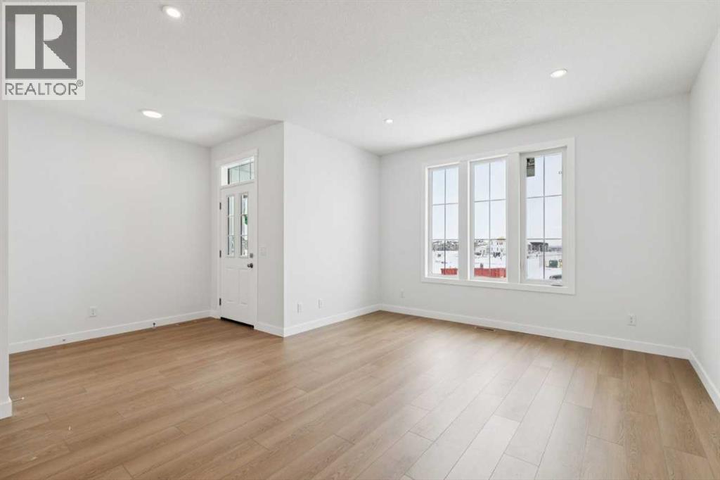 15453 45 Street SW, Calgary, Alberta  T2Y 1E2 - Photo 3 - A2283733